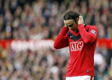 Ferguson console Berbatov