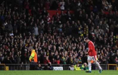 Rooney face à City