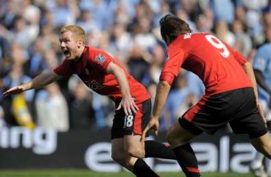 Sir Alex encense Scholes