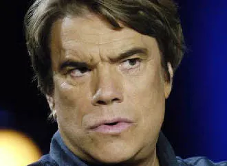 Tapie défend Domenech