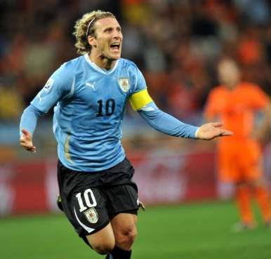 Ferguson encourage Forlan