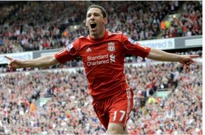 Kuyt félicite Maxi Rodriguez