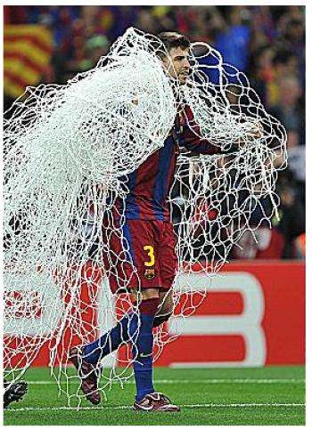 Photo : Piqué pique le filet