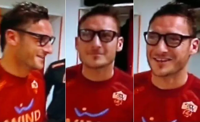 Photo : Totti, homme à lunettes