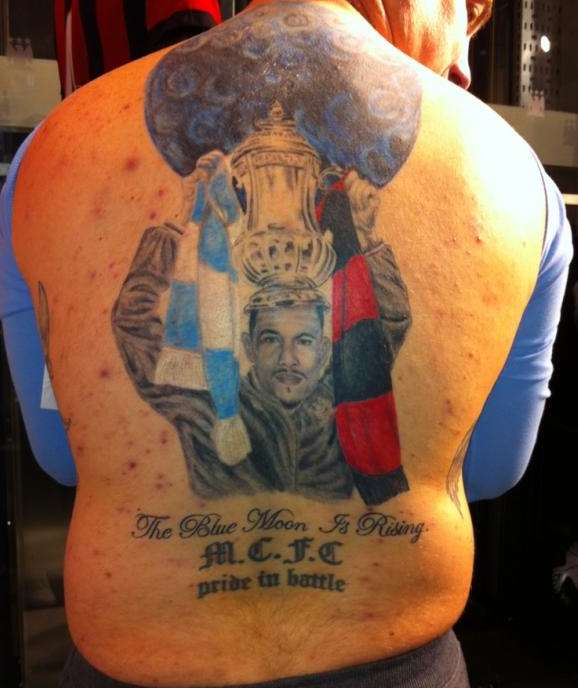 Photo : De Jong en tatouage