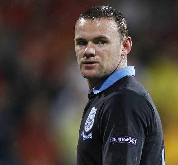 Rooney veut Redknapp
