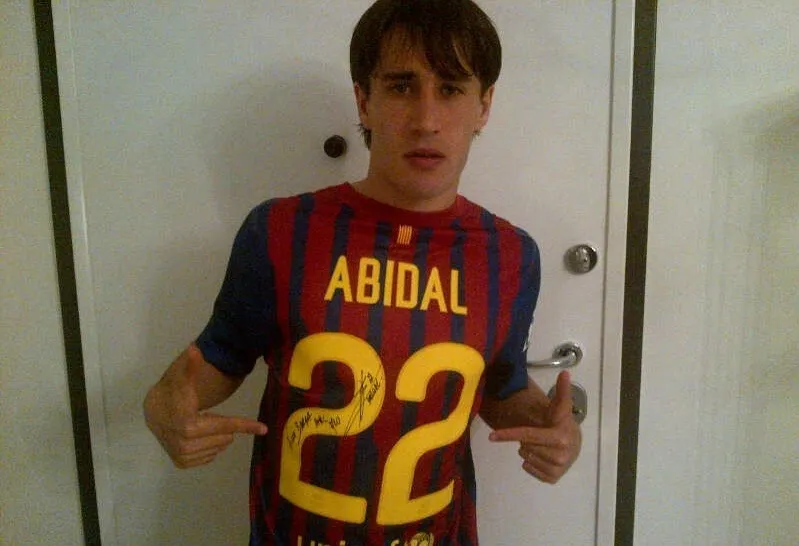 Photo : Bojan soutient Abidal