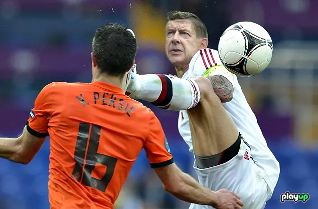 Photo : Wenger réagit pour RVP