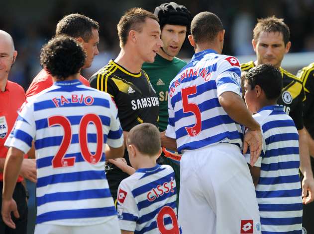 Photo: Anton Ferdinand esquive Terry