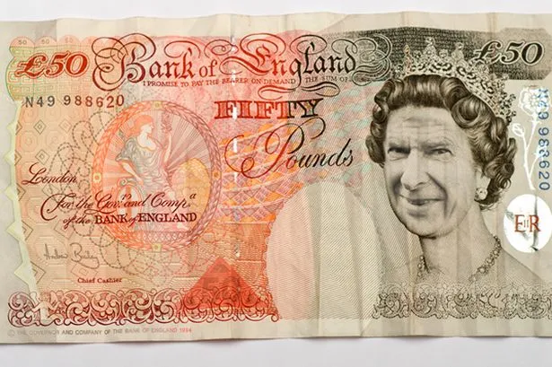 Photo : Wenger sur les billets anglais