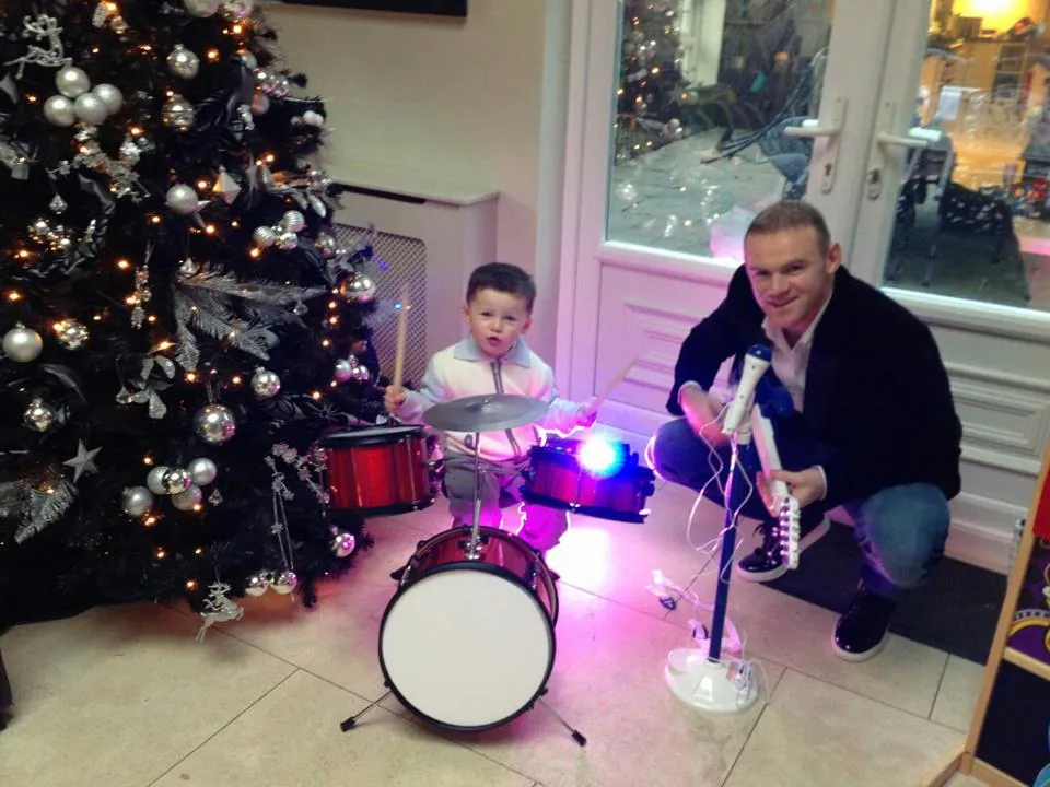 Photo: Rooney à la guitare