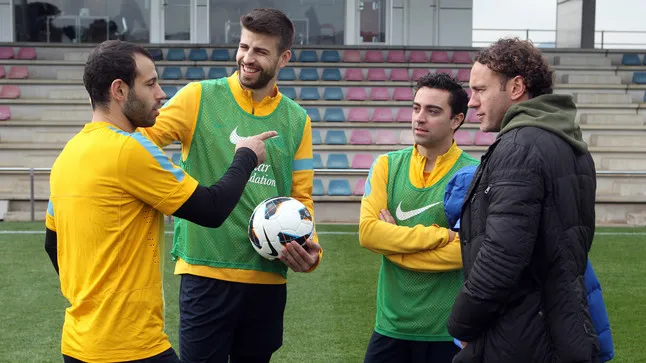 Photo : Milito en visite au Barça