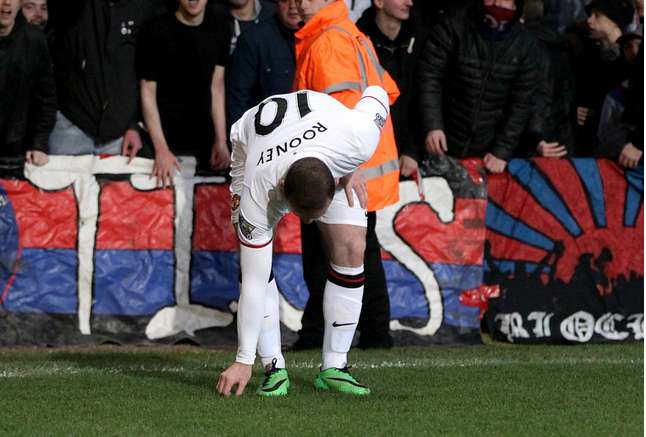 Photo : Rooney ramasse les pièces