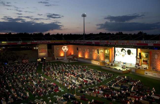 Photo : Au stade comme à la maison