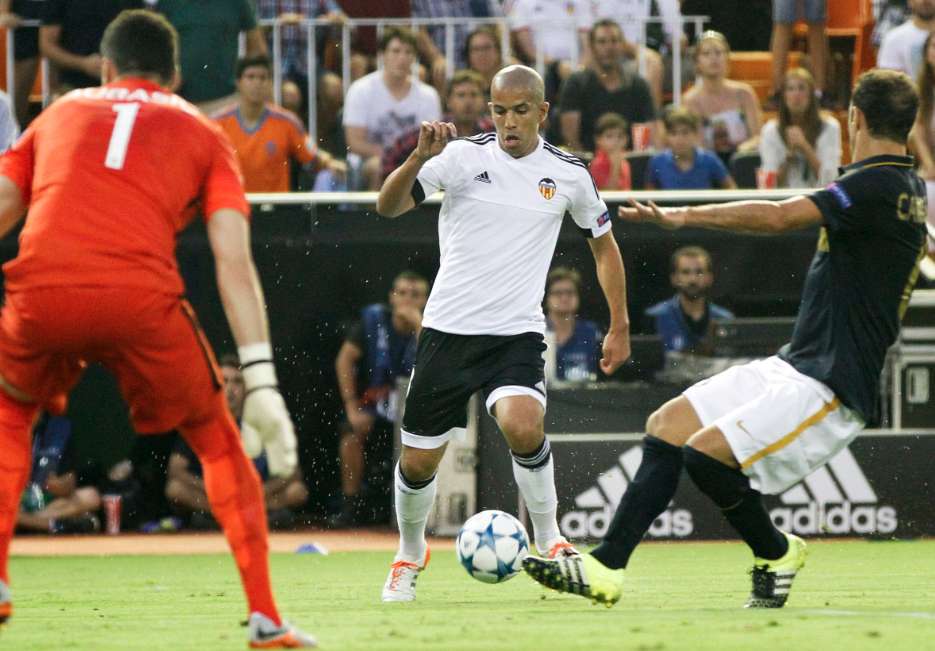 Un Feghouli et au lit