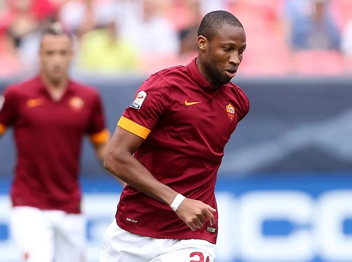 Seydou Keita et Pepe se chauffent