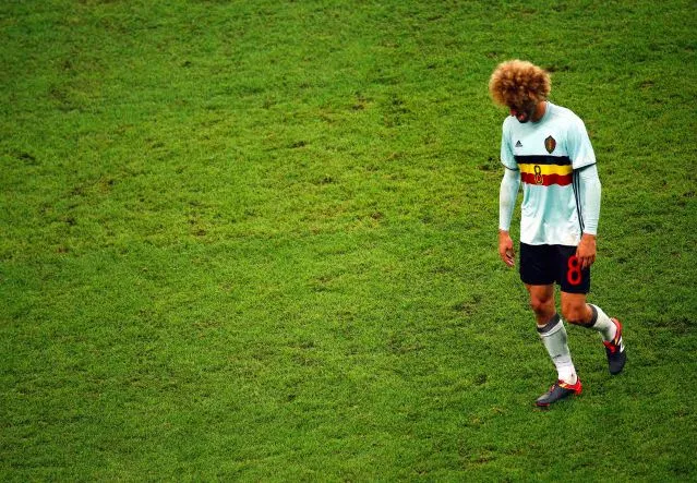 Fellaini se fume un cigare